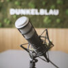 Abbildung von einem Mikrofon - DUNKELBLAU - Agentur für Krisenkommunikation, Krisenprävention und strategische Beratung